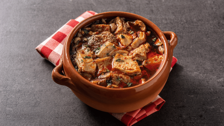 What Are Tripitas and How Are They Traditionally Served?
